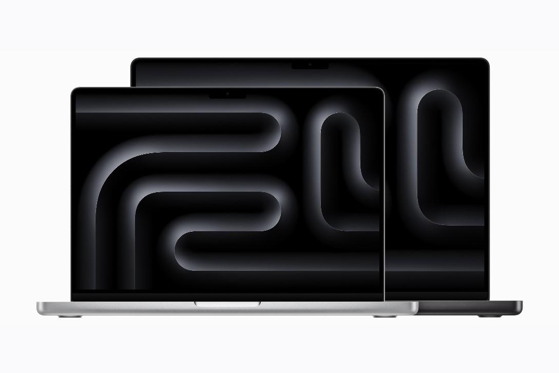 Apple MacBook Pro 14 Zoll und 16 Zoll nebeneinander, frontale Ansicht mit schwarzem Display und abstraktem Muster