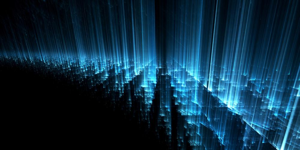 Schnelle Datenübertragung in der Stadt bei Nacht, visualisiert durch Lichtspuren entlang einer Straße zwischen Hochhäusern