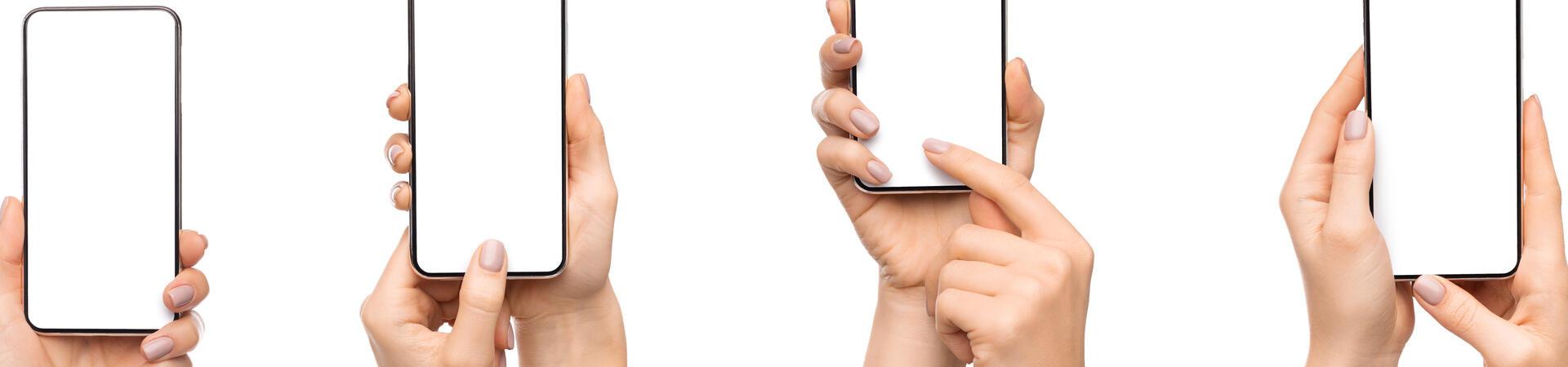 Hände halten verschiedene Smartphones mit leeren Displays vor weißem Hintergrund